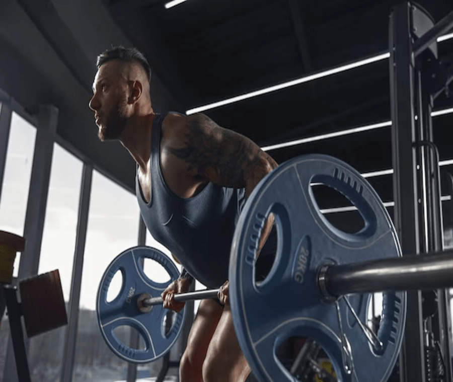 young-muscular-athlete-practicing-pull-ups-gym-with-barbell